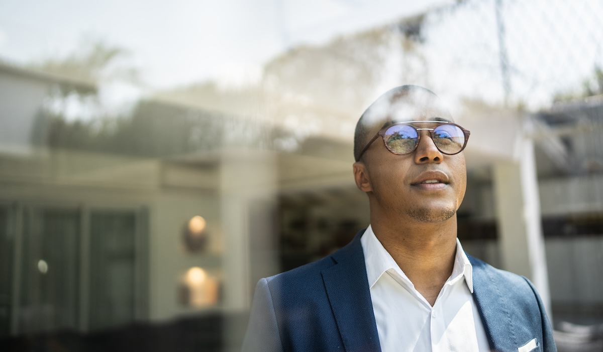 Businessman looking out of window