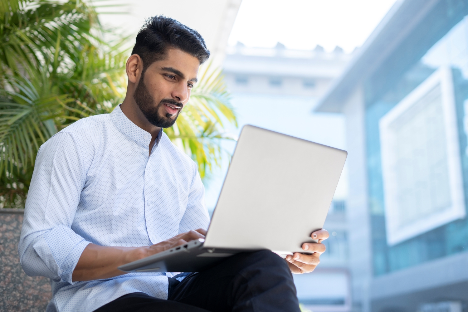specialist working on a laptop